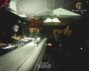 DJ performing at a nightclub with a mixing console and crowd in the background event text reads ETv30 Le Cirque JKT 08 May 2026